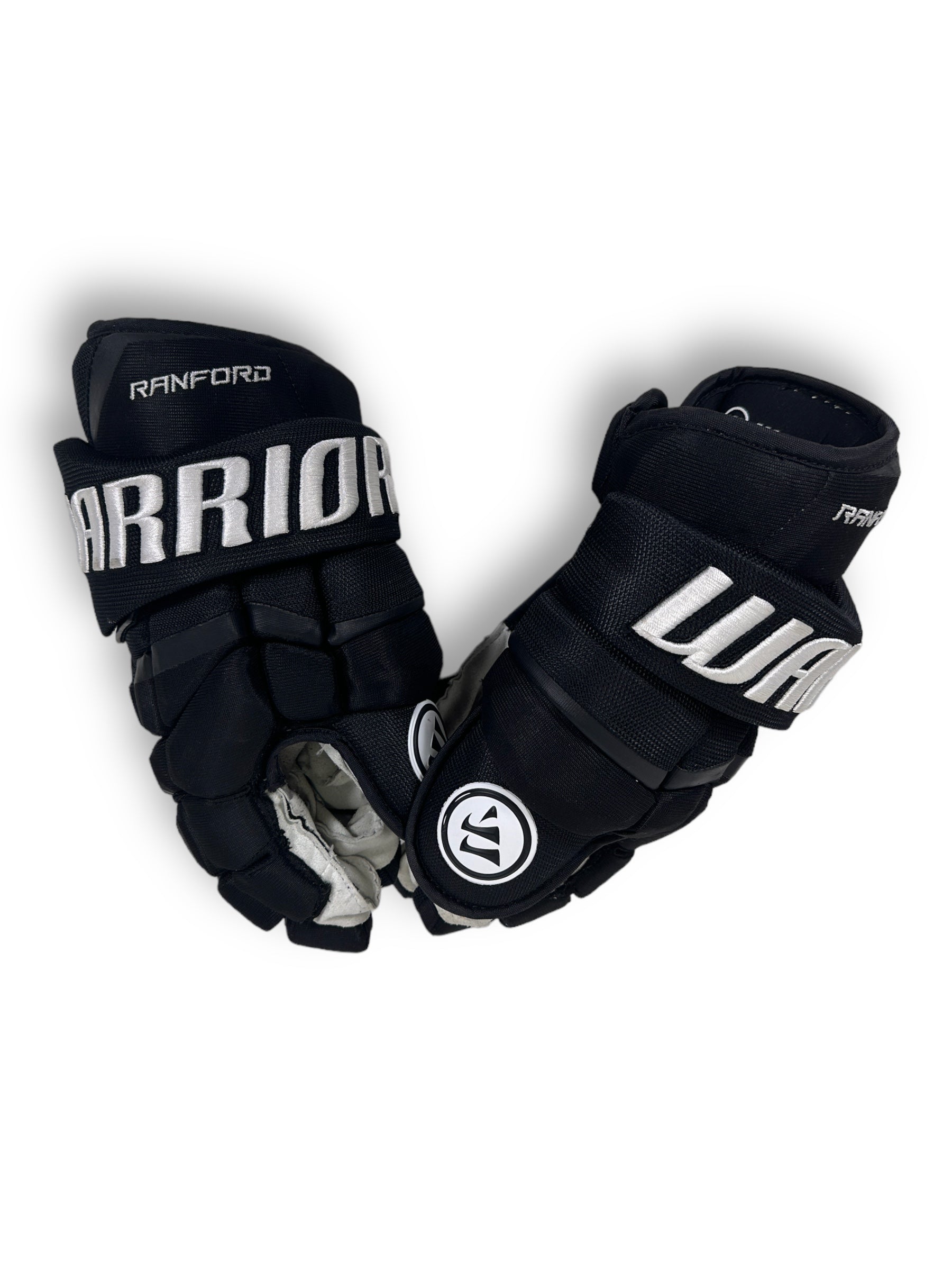 Black Warrior QRL gloves showing "RANFORD" embroidered into the cuff roll, with the Warrior logo on the thumb