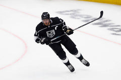 Photograph of Anze Kopitar wearing pants without the crown logo