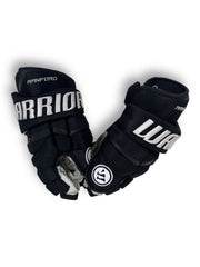 Black Warrior QRL gloves showing "RANFORD" embroidered into the cuff roll, with the Warrior logo on the thumb